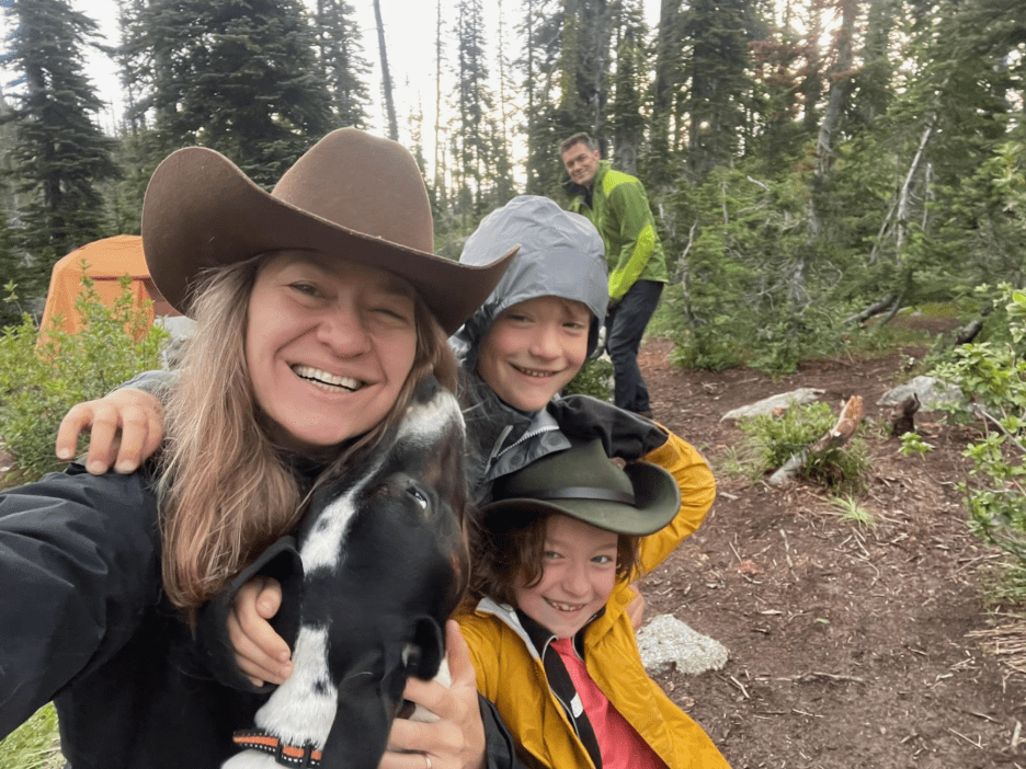 Dr. Hannah Robbins on a hike with her kids, husband, and dog